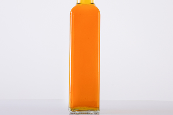 botella de aceite de vidrio